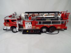 A New Bright Ind Co Fire Engine Ladder Truck No.