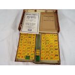 Mah-Jongg - a boxed set 'Chinese Game of Four Winds' with instruction booklets ca 1940s
