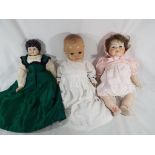 Dolls - a bisque headed dressed doll with jointed limbs, sleeping eyes,