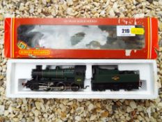 Model Railways OO Gauge - a Hornby steam locomotive and tender 2-6-0 op no 46521 BR Ivatt class 2