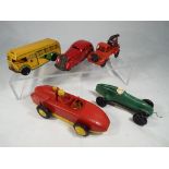 A tinplate Pocketoy Coach with clockwork mechanism, a red clockwork tinplate and plastic towtruck,