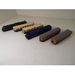 Dinky Toys - a LNER streamlined blue locomotive and two passenger carriages and a further BR