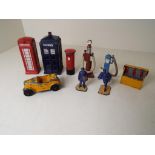 Dinky Toys - a telephone box, pillar box, police box, two petrol pumps, oil cabinet,