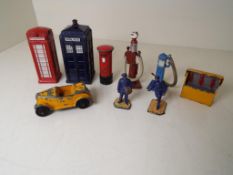 Dinky Toys - a telephone box, pillar box, police box, two petrol pumps, oil cabinet,