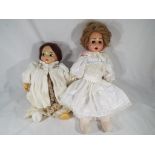 Dolls - a ceramic headed dressed doll with ceramic hands, glass eyes,