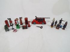 A good lot to include a clockwork fire engine complete with fire fighters,