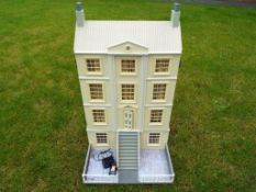 A doll's detached country residence set in its own grounds close to a leading provincial auction
