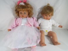 Two lifelike good quality dolls both marked to the back of the neck Nines Artesanals D'onil -
