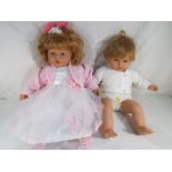 Two lifelike good quality dolls both marked to the back of the neck Nines Artesanals D'onil -