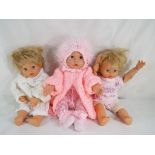 Dolls - a good quality clothed giggling and talking Lotus doll with arm and leg movement marked to