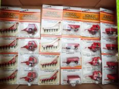 ERTL - 24 metal replica diecast Implements, 1:64 scale, mint in blister packs,