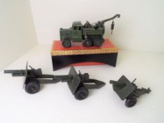 Four Military diecast models comprising a Dinky Recovery Tractor # 661 (fully functional),