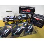 Ten diecast model racing cars predominantly Onyx,