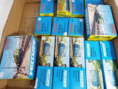 Vollmer - fourteen boxes of HO scale scenics by Vollmer to include overhead line, mast with base,