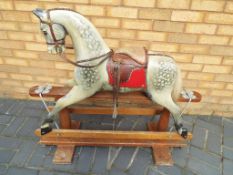 Kensington Rocking Horse Company - a good quality wooden carved dapple grey painted rocking horse