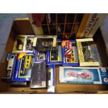 Diecast - a glass fronted display cabinet for model motor vehicles and thirteen diecast model motor