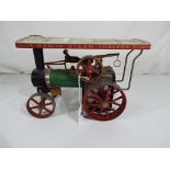 A Mamod steam tractor,