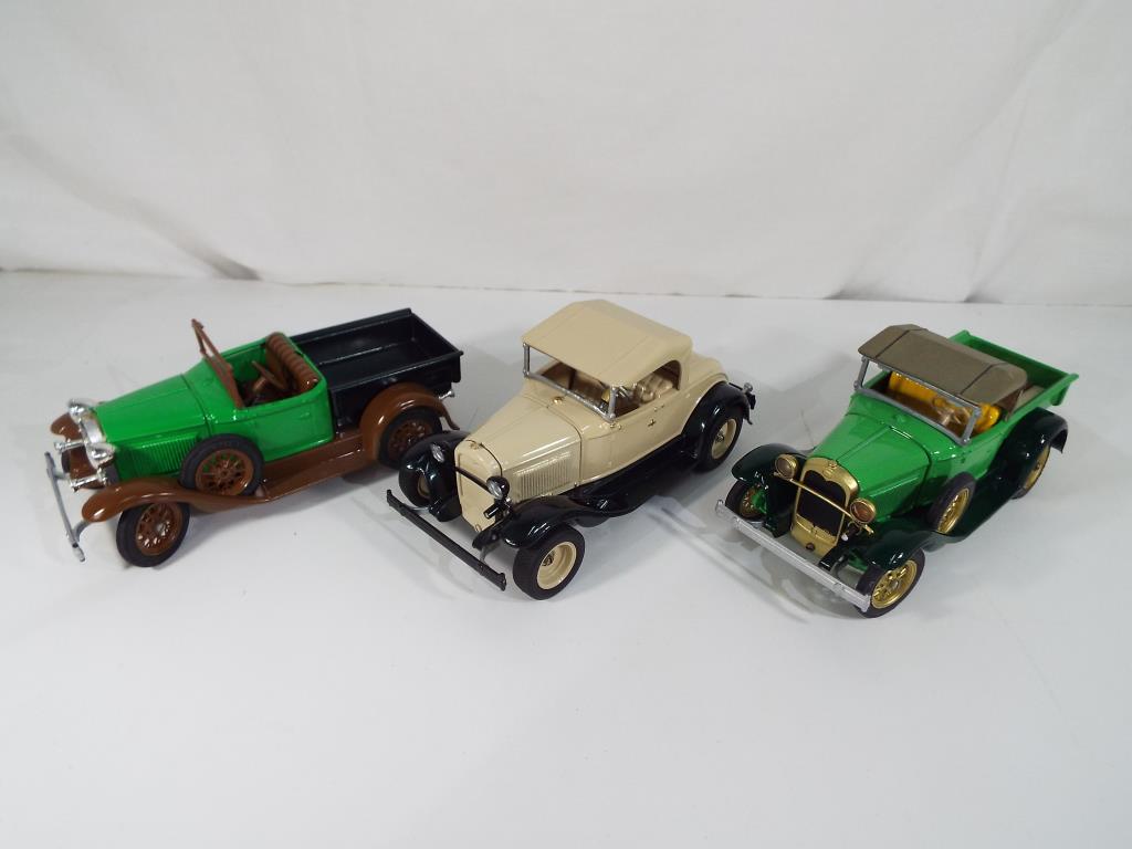 Hubley Models - three Hubley Models metal kit cars to include a Model A Ford Pickup in brown and