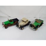 Hubley Models - three Hubley Models metal kit cars to include a Model A Ford Pickup in brown and