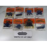 Ertl - Approximately 45 diecast metal implements by Ertl, in 1:64 scale, to include "Wing Disc",