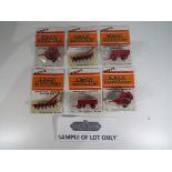 ERTL - approx 48 diecast metal implements by ERTL to include International Harvester six bottom