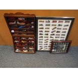 A good lot to include two glass fronted display cabinets containing diecast model motor vehicles