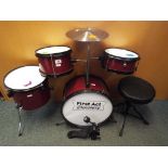 A good quality child's drum kit to include bass drum, tom tom's,