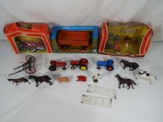 A good lot to include a quantity of farming related toys to include Matchbox tractors,