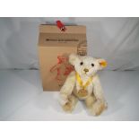 Steiff - A Steiff Millennium Bear, exclusive to Danbury Mint, button in ear with tag, No 654701,