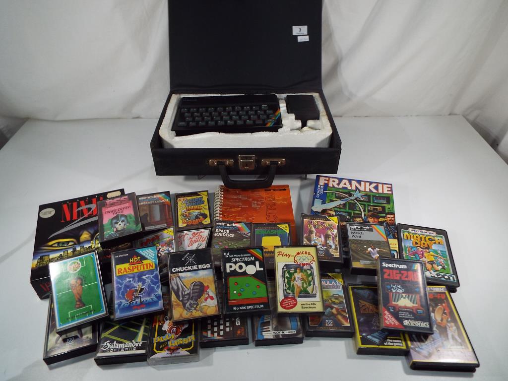A Sinclair ZX Spectrum gaming computer with power pack,
