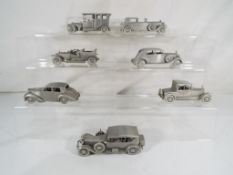 Danbury Mint - seven cast pewter models of Rolls Royce cars by Danbury Mint to include 1930 Phantom