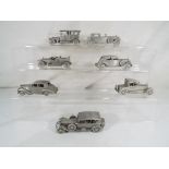 Danbury Mint - seven cast pewter models of Rolls Royce cars by Danbury Mint to include 1930 Phantom