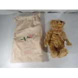 A Steiff 2002 limited edition French exclusive "La Vie En Rose" musical teddy bear, blond mohair,