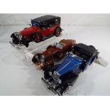 Franklin Mint - three unboxed model motor vehicles by Franklin Mint to include the 1933 Duesenberg