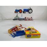Britains and Dinky Toys - a collection of farming models by Britains and Dinky to include tractors,