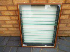 Display case - a good quality wooden glass fronted wall mountable display case with 12 shelved 64