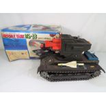 A Modern Toys tinplate battery operated MS-33 missile tank missing four missiles,