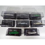 Diecast models - eight diecast model motor vehicles all in presentation sealed cases to include an