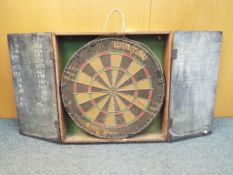 A dartboard in carry case