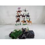 Britains - a quantity of Britains toys to include cavalry soldiers, show jumpers, shrubs, fencing,
