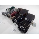 Franklin Mint - four unboxed diecast model motor vehicles by Franklin Mint to include 1907 Rolls