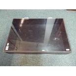 A wooden display case with clear plastic hinged lid,