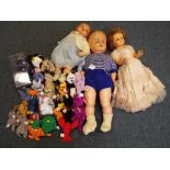 A good lot to include three dressed dolls one with bisque head, sleeping eyes and open mouth,