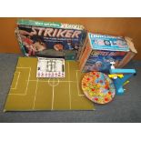 A Striker 5-aside football game with a kick table-top by Parker in original box and a Chutes Away