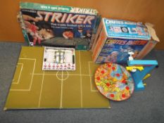 A Striker 5-aside football game with a kick table-top by Parker in original box and a Chutes Away