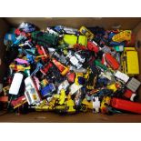 Diecast - a box containing a large quantity of unboxed predominantly playworn diecast model motor