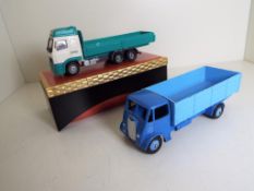 Dinky Supertoys - a Guy 4-ton lorry, mid blue cab and chassis, pale blue back and ridged hubs # 511,