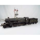 Model railways - an O gauge tin-plate and diecast electric powered model locomotive 4-6-0 'Isambard