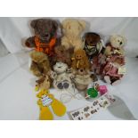 Teddy bears - a collection of thirteen vintage and modern teddy bears and stuffed toys,