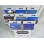 Eleven diecast model airplanes 1:500 scale,